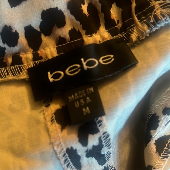 Woman’s cheetah dress made by Bebe size medium great condition very comfortable! - Picture 6 of 6